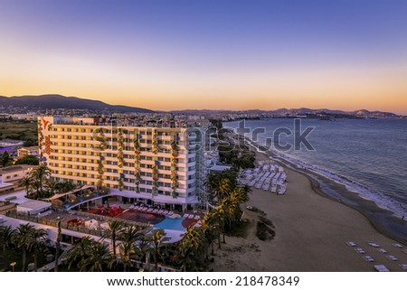 Ibiza, Spain - July 4, 2014: Ushuaia Hotel on Playa d\'en Bossa Beach in Ibiza. One of the famous hotel in Ibiza during sunset.