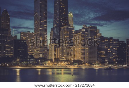 Modern architecture by dusk with reflections in the water