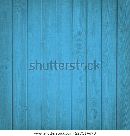Horizontal blue wooden fence close up