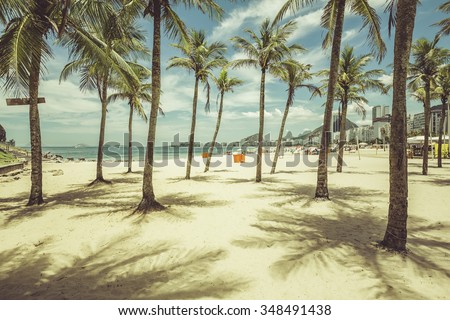 Palms with shadows on Copacabana Beach in Rio de Janeiro, Brazil. Vintage colors