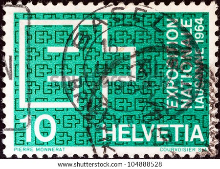 SWITZERLAND - CIRCA 1963: A stamp printed in Switzerland issued for the Swiss National Exhibition, Lausanne shows Exhibition Emblem, circa 1963.
