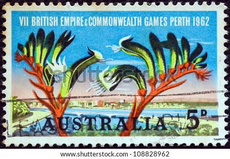 AUSTRALIA - CIRCA 1962: A stamp printed in Australia issued for the British Empire and Commonwealth Games, Perth shows Perth and Kangaroo Paw plant, circa 1962.