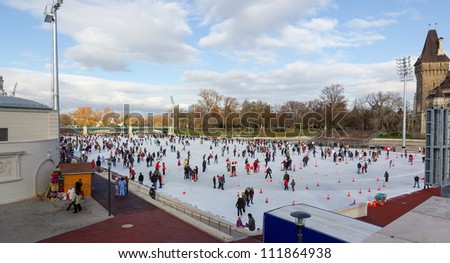 BUDAPEST, HUNGARY - DECEMBER 31: City Park ice rink on December 31, 2011 in Budapest, Hungary. City Park is Europe\'s largest outdoor ice skating rink in the winter and a lake for boating in the summer