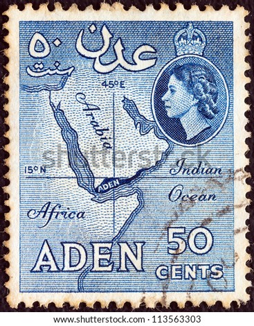 ADEN COLONY - CIRCA 1953: A stamp printed in United Kingdom shows map of Arabian peninsula and Queen Elizabeth II, circa 1953.