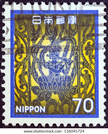 JAPAN - CIRCA 1980: A stamp printed in Japan shows flautist, Horyu temple, circa 1980.
