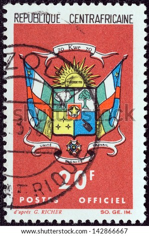 CENTRAL AFRICAN REPUBLIC - CIRCA 1965: A stamp printed in Central African Republic shows Coat Of Arms, circa 1965.