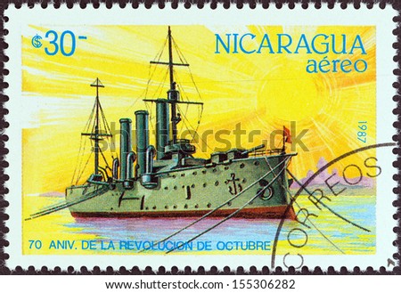 NICARAGUA - CIRCA 1987: A stamp printed in Nicaragua issued for the 70th anniversary of Russian Revolution shows cruiser Aurora, circa 1987.