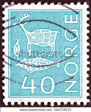 NORWAY - CIRCA 1963: A stamp printed in Norway shows rock engravings, Reindeer, fish, animal trap, circa 1963.