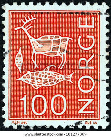 NORWAY - CIRCA 1973: A stamp printed in Norway shows rock engravings, Reindeer, fish, animal trap, circa 1973.