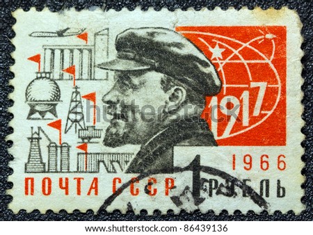 USSR - CIRCA 1966: A postage stamp printed in USSR shows Russian Marxist revolutionary and communist politician Vladimir Ilyich Lenin and the year of the October revolution (1917), circa 1966.