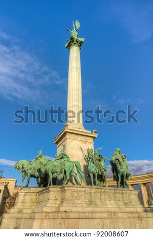 Heroes square, column topped by a statue of the archangel Gabriel, Budapest, Hungary