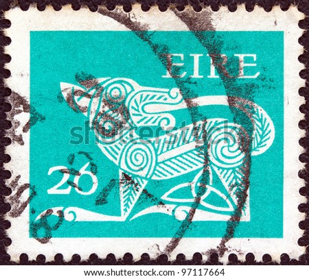 IRELAND - CIRCA 1971: A stamp printed in Ireland shows a dog from an ancient artwork, circa 1971.