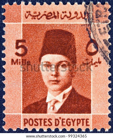 EGYPT - CIRCA 1937: A stamp printed in Egypt issued for the Investiture of King Farouk, shows a portrait of King Farouk, circa 1937.