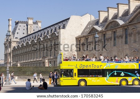 PARIS, FRANCE -  APRIL 25: Bus with tourist \