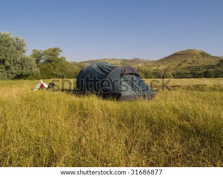 Green big tent on the meadow in Georgia, Caucasus