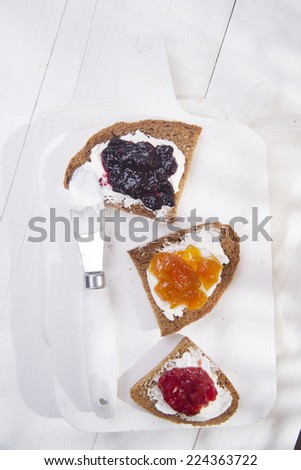 Italian breakfast made with whole wheat bread, butter and jam