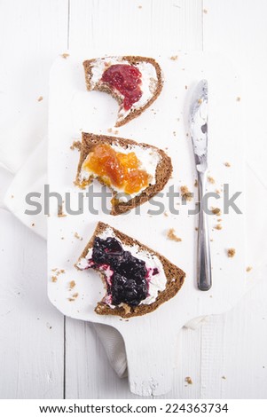 Italian breakfast made with whole wheat bread, butter and jam