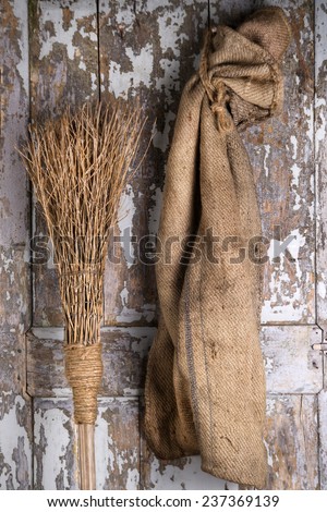 The instruments of work of the Epiphany, magic broom and lots of coal