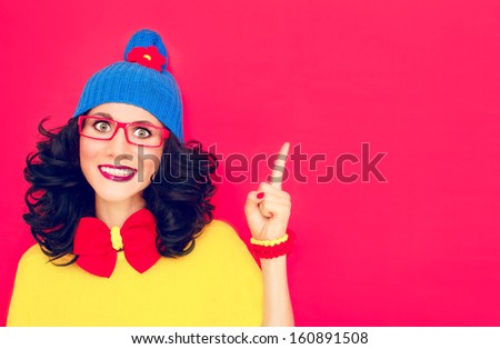 Funny girl with index finger