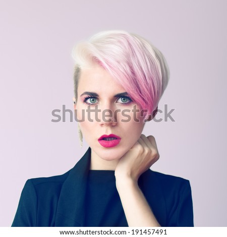 Sensual portrait of a girl with a stylish haircut