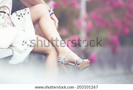 Romantic summer look. Shoes and dress summer girl