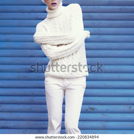 Portrait Stylish Lady in White glamorous clothes. Fall Winter Fashion Style