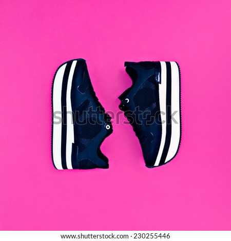 Stylish Fashion Sneakers on pink background. Glamour and Sport Style
