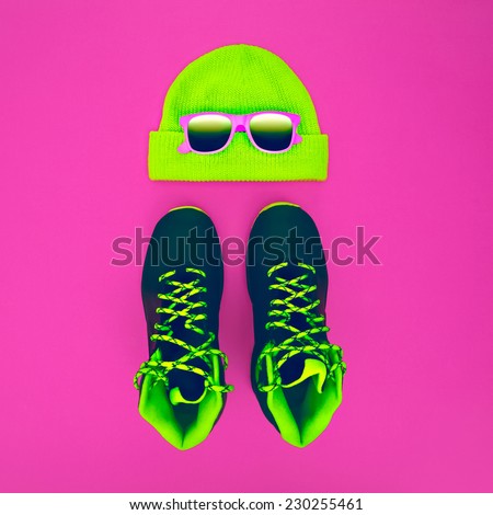 Stylish fashion Sport Accessories: Sneakers, Sunglasses, Hat on Crimson background