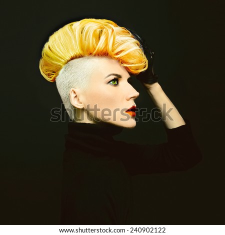 Sensual portrait Lady with fashionable Haircut. Colored hair on black background