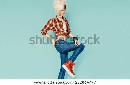 Funny Blond model with stylish Haircut on blue background. Country style, Cowboy style fashion