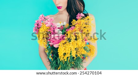 Spring Fashion Lady with bouquet of beautiful flowers - March 8