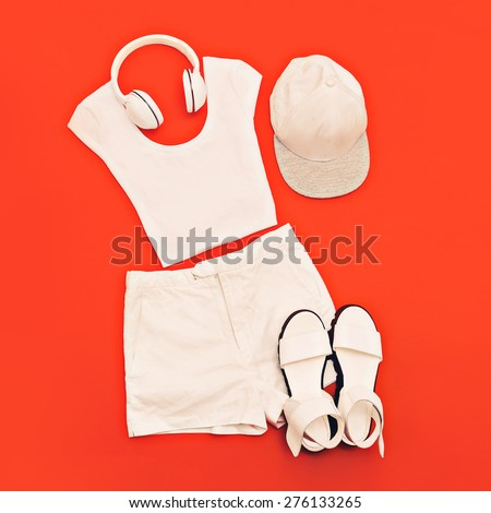 White set. White clothes and Accessories on bright pink background. Urban style