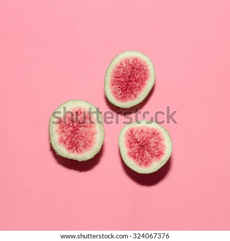 Fresh figs on pink background.Vanilla Fashion Style