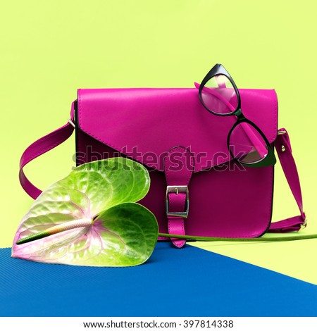 Stylish Lady Crimson Accessories. Bag and eyeglasses.