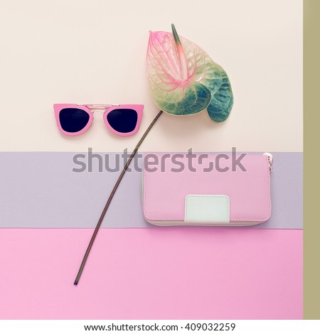Ladies Fashion Accessories. Pink Clutch and sunglasses. Pastel colors Trend