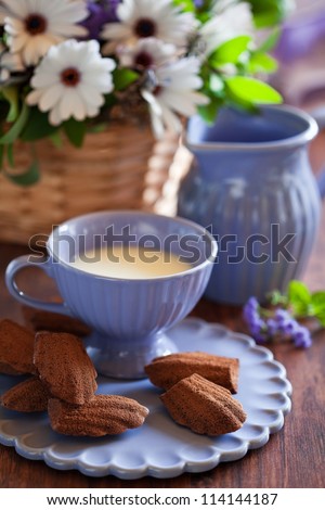 Chocolate madeleine cookies with lavender and lemon, selective focus
