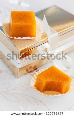 Fruit jelly candy with vanilla and gift box, selective focus