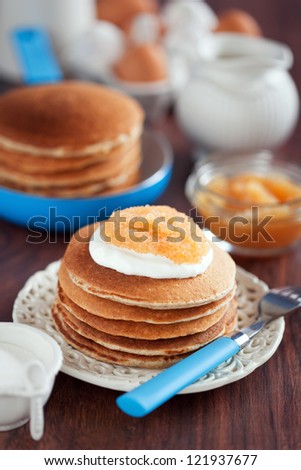 Buttermilk oat bran pancakes with pike caviar, selective focus