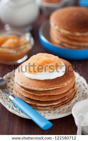 Buttermilk oat bran pancakes with pike caviar, selective focus