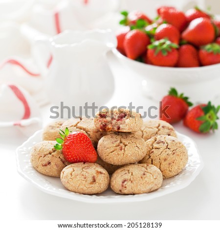 Oat bran, coconut and strawberry cookies, selective focus