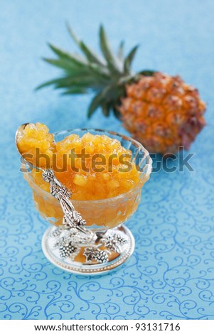 Homemade ??pineapple jam and fresh pineapple, selective focus