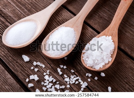 sea salt different grinding in a wooden spoons