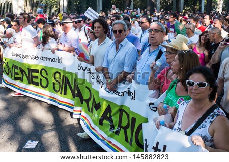 MADRID, SPAIN - JULY, 6: People participating on a demonstration at the Gay Pride parade on July 6, 2013 in Madrid (Spain). Near 1,200,000 people participated at the Gay Pride Parade in Madrid.