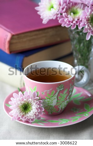 Tea cup and saucer with pink flowers