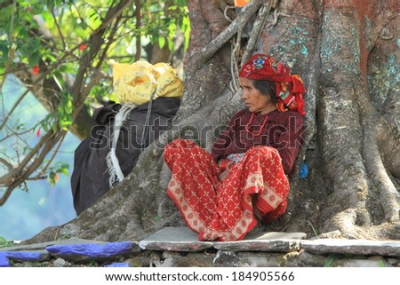 Poverty Woman is sitting in the shadows