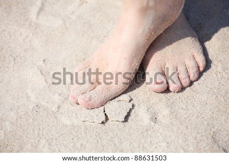 nice legs pedicure red nail sand beach