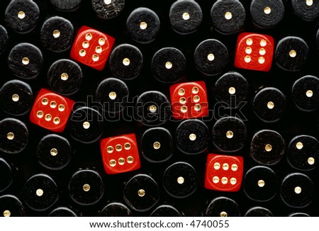 some red dices showing six between black dices showing one