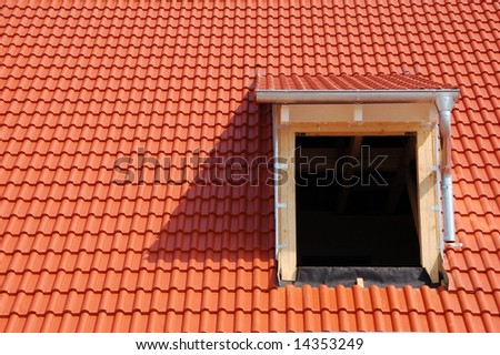 dormer window construction. dormer window construction. stock photo : New roof with tiles and dormer