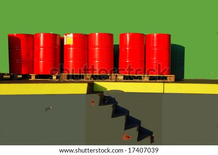 Red oil drums on a shipping ramp