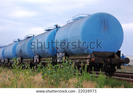 Blue chemical tank train wagon